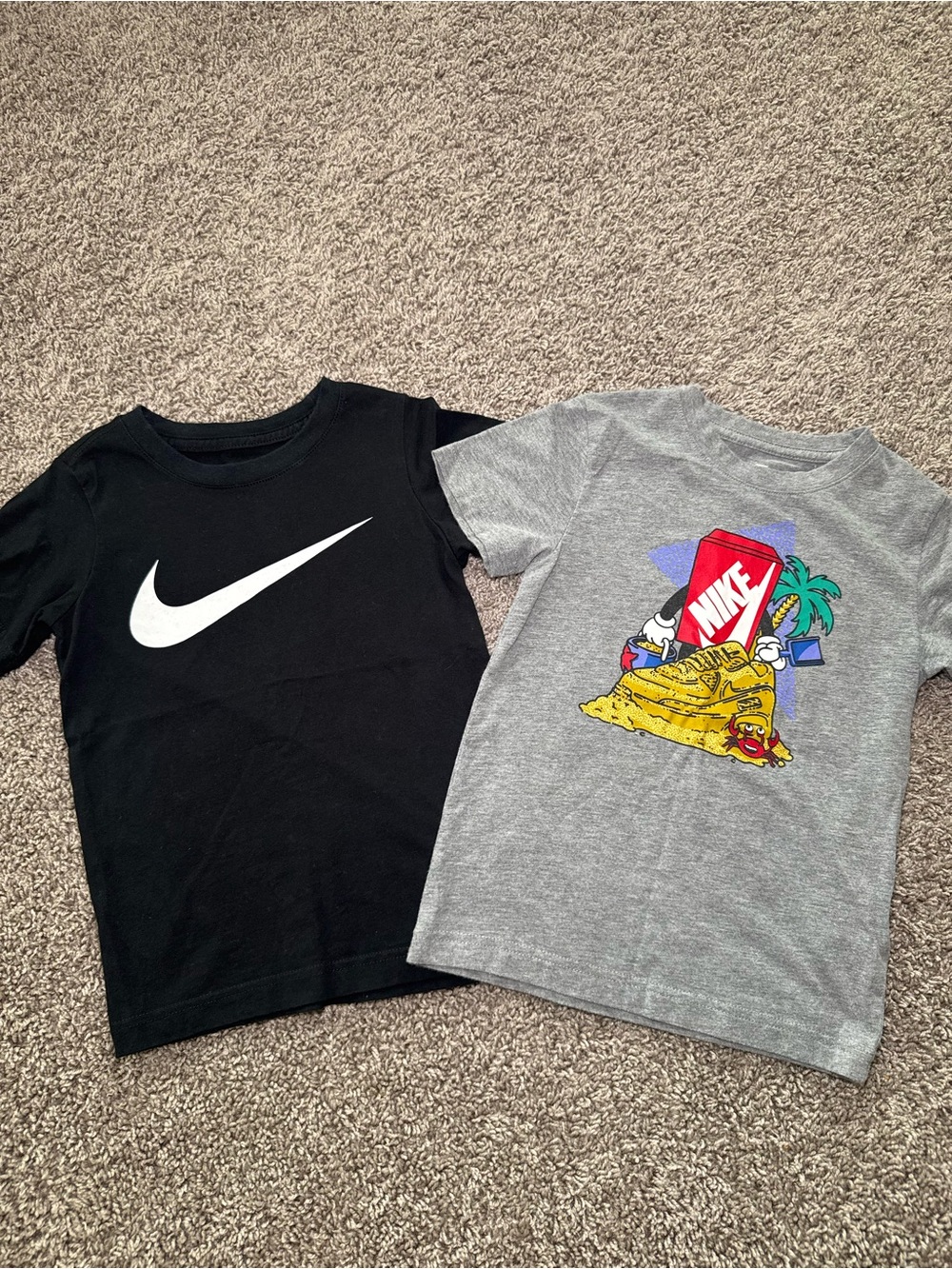 Nike Kids Black Swoosh T-Shirt pair